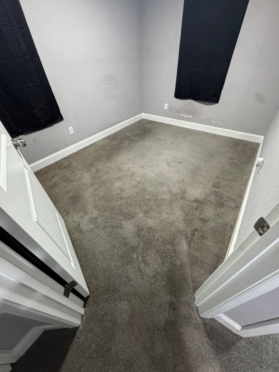 Before and after carpet cleaning in a bedroom before