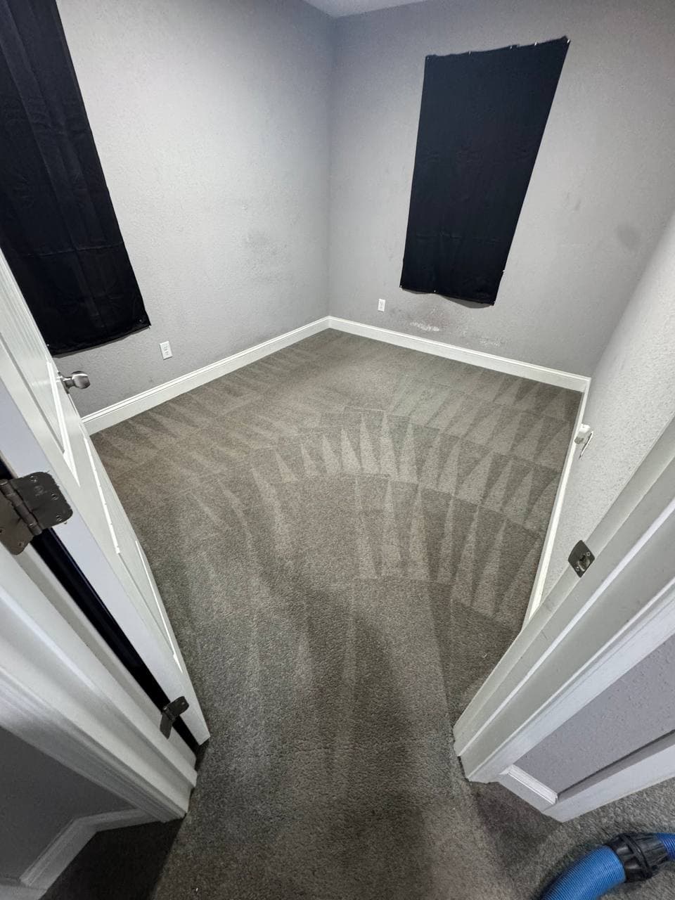 Before and after carpet cleaning in a bedroom after