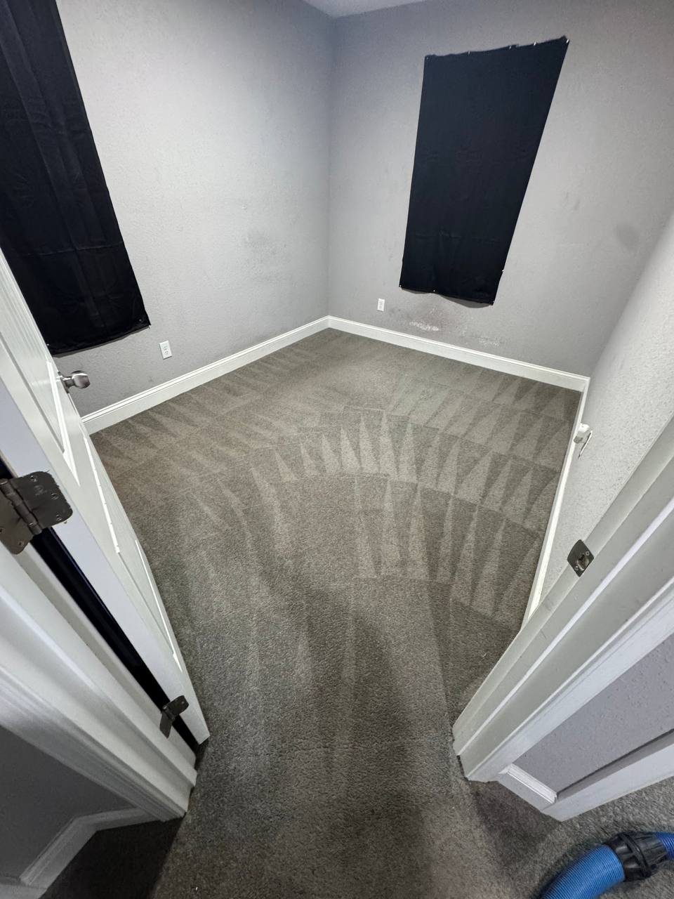Before and after carpet cleaning in a bedroom after